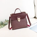 Elegant burgundy wine vintage handbag with geometric patterns and golden metal lock - Red