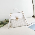 White floral leather handbag with gold shield lock and detachable shoulder strap - White