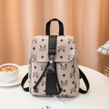 Beige mini backpack with monogram print featuring flap buckle and drawstring closure - White Floral Print