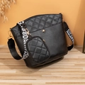 Black quilted bucket bag set with wide shoulder strap and small matching coin purse - Black