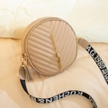 Beige round crossbody bag with V-quilt pattern, gold tassel and stylish letter strap - Khaki