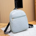 Mochila pequeña azul claro acolchada en V con correas de tejido y logo impreso - Azul