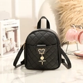 Black quilted mini backpack for women featuring a gold Mickey silhouette charm - Black