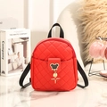 Red quilted mini backpack with cartoon mouse buckle and adjustable black straps - Red