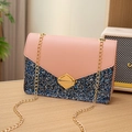 Pink leather and blue sequin chain crossbody bag with a golden diamond-shaped lock - Pink