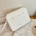 Minimalist white square PU leather crossbody bag with circular hollow-out design - White
