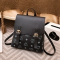 Classic black leather backpack with gold buckles and LBS pattern print on the lower half - Black