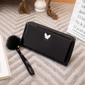 Glossy black patent leather long zipper wallet for women with butterfly emblem and fur ball - Black