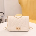 Chic beige quilted chain shoulder bag with vintage gold-tone twist lock closure - White