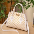 Chique witte lederen handtas met geel geometrisch patroon en gouden sluiting - Wit