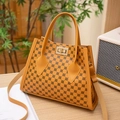 Gele mini-crossbodytas met vintage bloemenpatroon en gouden metalen draaisluiting - Bruin