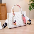 White quilted rectangular handbag with floral silk scarf and patterned wide strap - White