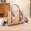 Elegant beige quilted handbag with silk scarf handle and printed wide fabric strap - Khaki
