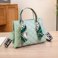 Mint green quilted crossbody bag with decorative silk scarf handle and logo strap - Green
