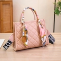 Pink quilted crossbody bag with silk scarf handle and wide textile logo shoulder strap - Pink