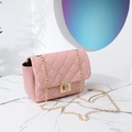 Pale pink quilted crossbody bag with gold chain strap and square turn-lock closure - Pink
