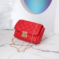 Red quilted faux leather crossbody bag with golden chain strap and swivel lock - Red