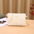 Quilted beige square crossbody bag with gold chain strap and elegant metal plate - White