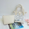 Durchsichtige PVC-Handtasche mit Gänseblümchen-Print und cremefarbener Innentasche - Weiß