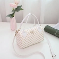 White Boston handbag with golden circle print and butterfly charm with shoulder strap - White
