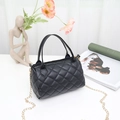 Elegant black quilted Boston handbag with golden chain strap and double handles - Black