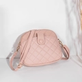 Pink shell-shaped crossbody bag with diamond quilting and adjustable shoulder strap - Pink