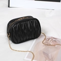 Elegant black pleated PU leather oval shoulder bag with golden chain strap for women - Black