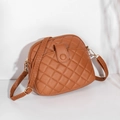 Brown shell-shaped crossbody bag with quilted texture and golden hardware details - Brown