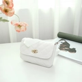 Chic white quilted waist bag with gold rotary clasp and wide fabric strap for women - White