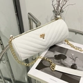White cylinder chain bag with quilted leather texture and gold tree emblem - White