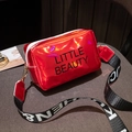 Red glossy metallic camera bag with Little Beauty print and wide webbing strap - Red