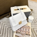 Elegant white crocodile embossed crossbody bag with gold chain strap on grey carpet - White