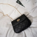 Small black quilted chain bag with gold rotary lock and leather finish texture - Black