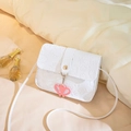 White embossed leather crossbody small square bag with cartoon patterns and heart pendant - White