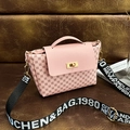 Pink quilted crossbody bag with circular patterns and wide branded shoulder strap - Pink Print