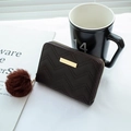 Dark brown quilted short wallet with zipper, gold nameplate and fluffy fur keychain - Coffee