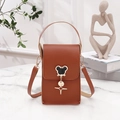 Vertical brown faux leather crossbody bag with cute metal cat pendant and adjustable strap - Brown