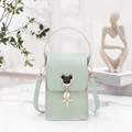 Mint green mini crossbody bag with litchi texture and cute mouse shaped hardware decoration - Green