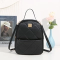 Elegant black quilted backpack for women featuring gold hardware and a versatile design - Black