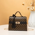 Vintage crossbody Kelly bag with golden clover pattern and black leather trim - Black