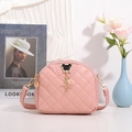Pink quilted shell-shaped crossbody bag with gold-tone Mickey hardware detail - Pink