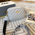 Grey quilted crossbody bag with golden hardware and a wide graphic lettered strap - Gray