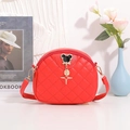 Chic red circular crossbody bag featuring quilted patterns and mouse shaped ornament - Red