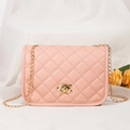 Quilted light pink crossbody bag with golden C-shaped clasp and delicate chain strap - Pink