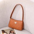 Quilted caramel brown underarm bag with elegant white butterfly detail and shoulder strap - Brown