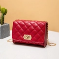 Classic red quilted crossbody bag with gold chain strap and elegant metallic turn-lock - Red