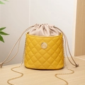 Yellow rhombic quilted drawstring bucket bag with gold chain strap and metal logo - Yellow