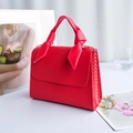 Mini red crossbody handbag with chain strap and bow handle for women stylish bag - Red