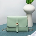 Mint green cross-body chain bag in synthetic leather with a golden buckle closure - Green