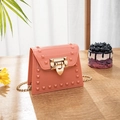 Coral pink jelly studded chain bag with leaf clasp and gold metal crossbody strap - Pink